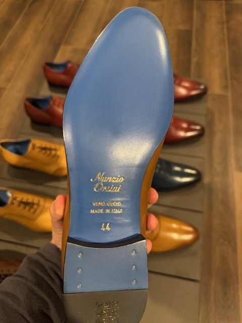 Sky-blue Vero Cuoio leather sole stamped Made in Italy in gold, signature of Nunzio Orsini handmade Oxford shoes