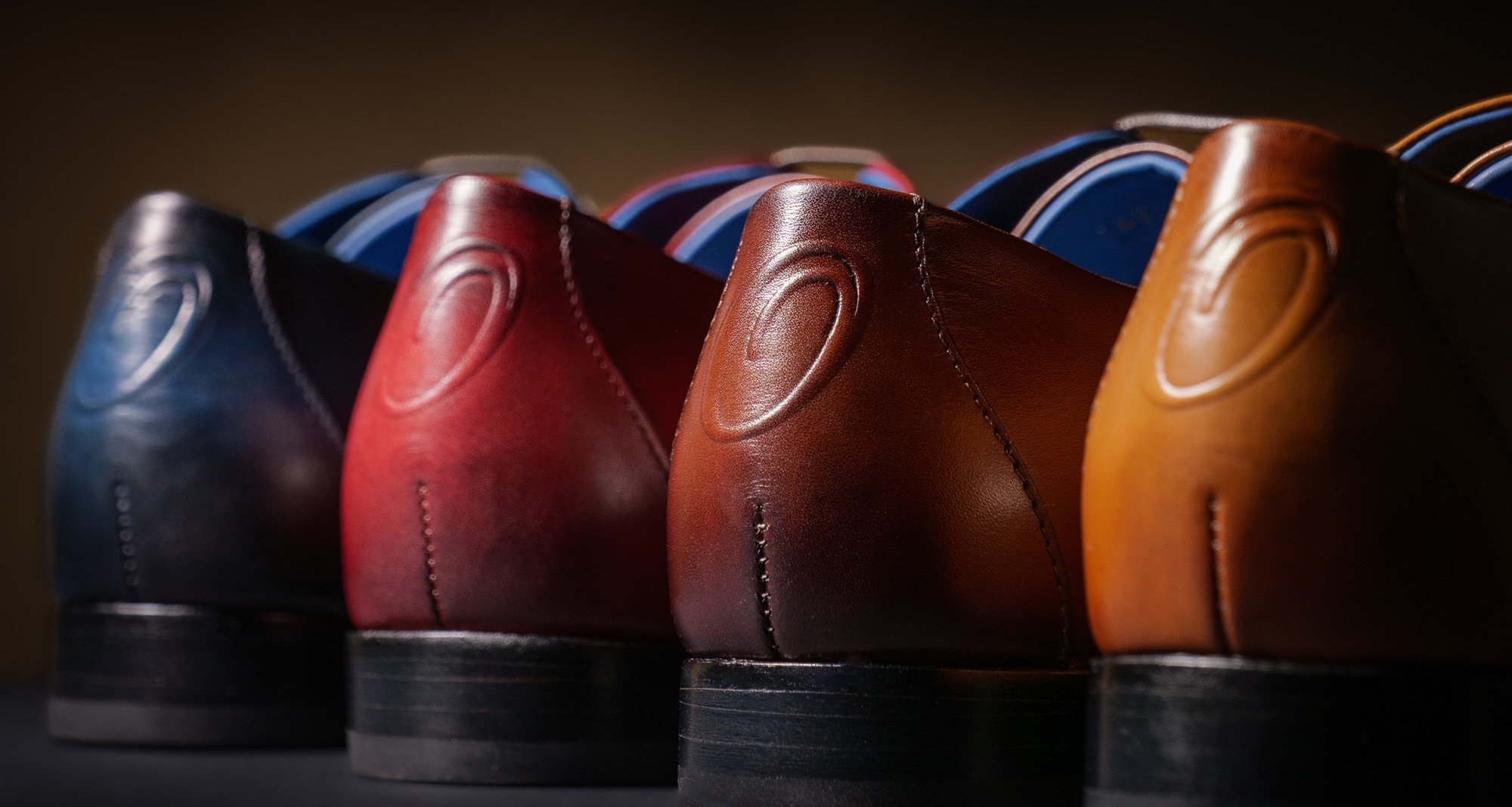 All four Nunzio Orsini colorways in a heel lineup with the embossed Orsini O