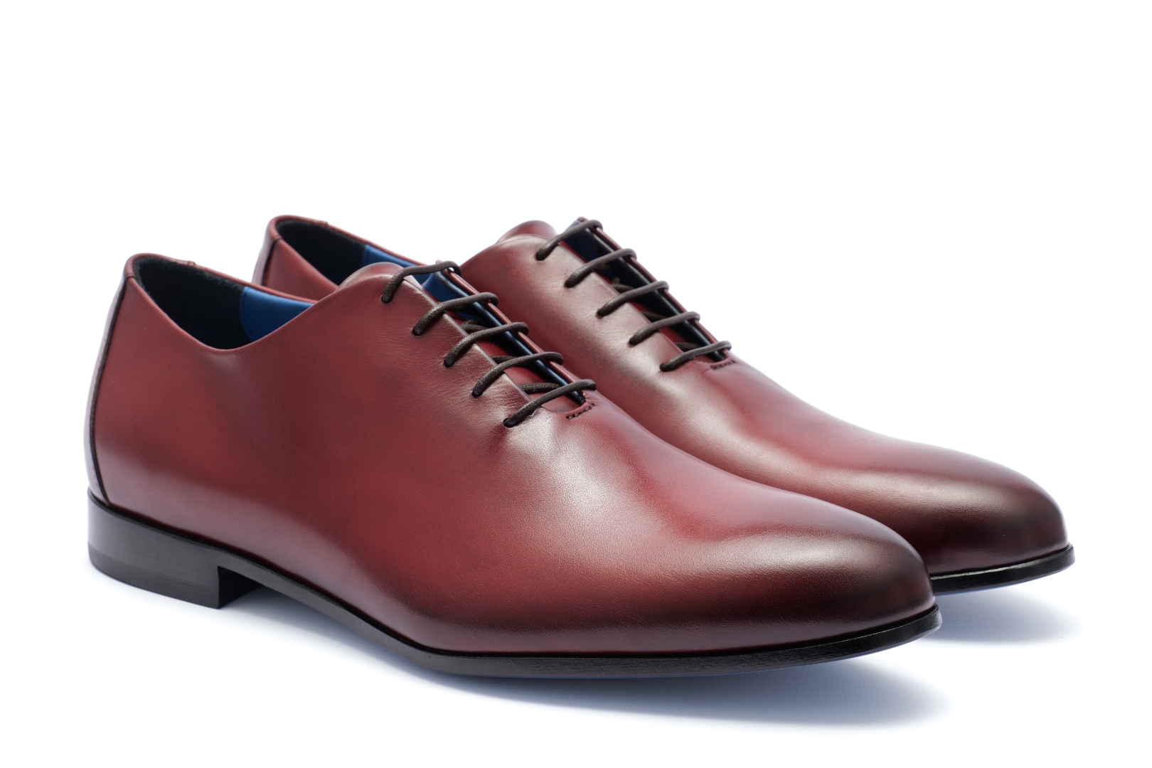 The Francesco by Nunzio Orsini — angled pair view, whole-cut Oxford in top grain Italian leather