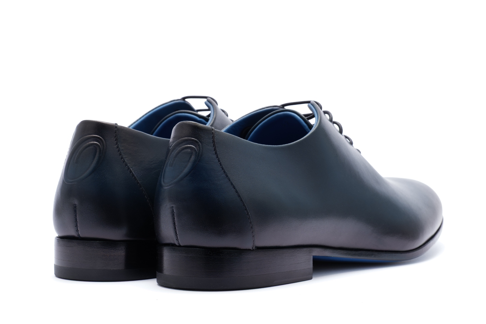 The Nunzio by Nunzio Orsini — heel view, signature dark blue whole-cut Oxford in top grain Italian leather, Marche Italy