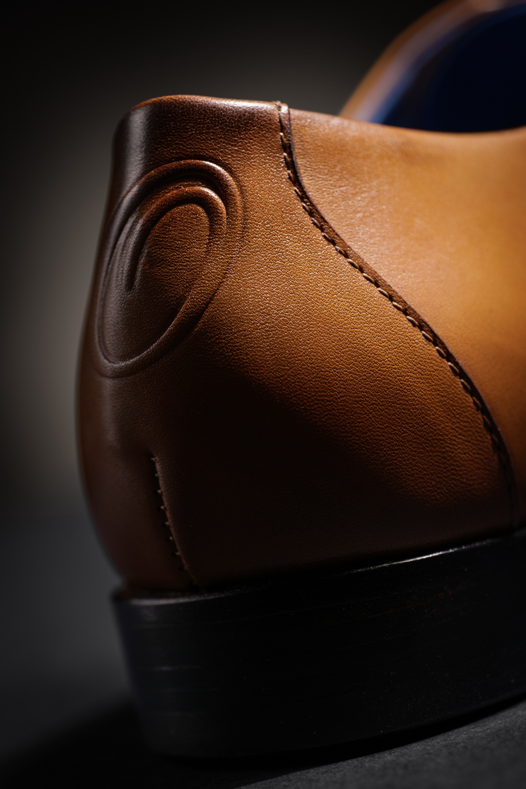 Embossed Orsini O monogram on the heel counter of a Nunzio Orsini handmade Oxford shoe